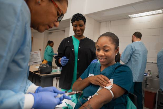 Nurse taking Blood